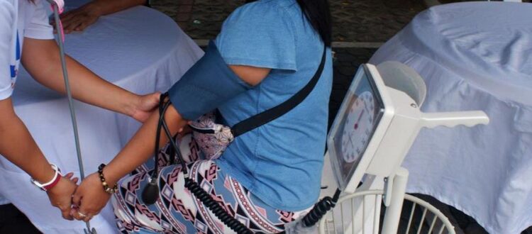 A group of medical volunteers from VMCLF providing free medical check-ups to residents of a community in Davao City, Philippines.