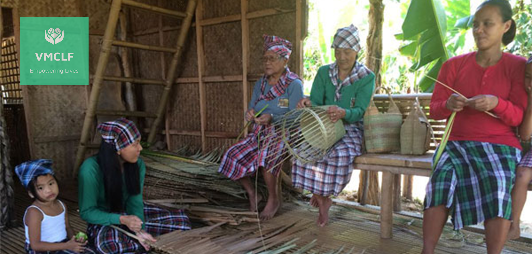 Silhouette of an indigenous person, holding a woven basket.